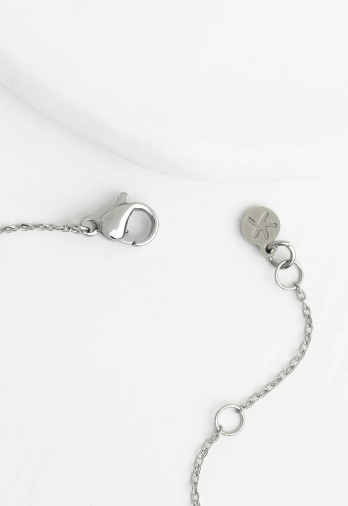 Radiant Cross Necklace in Silver